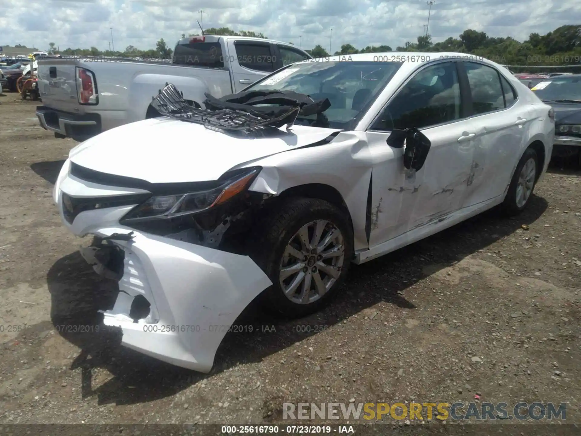 2 Photograph of a damaged car 4T1B11HK7KU244950 TOYOTA CAMRY 2019