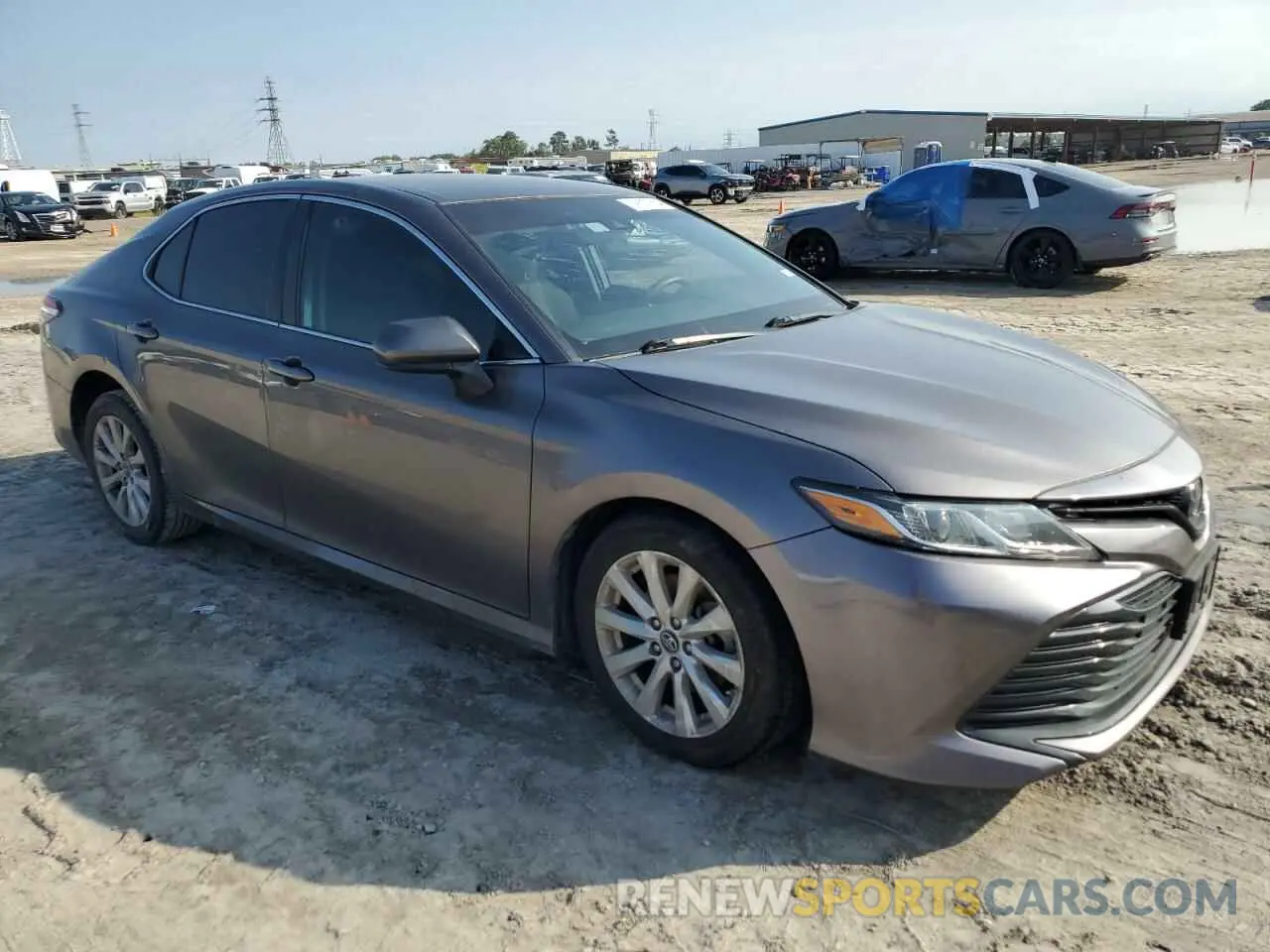 4 Photograph of a damaged car 4T1B11HK7KU245175 TOYOTA CAMRY 2019