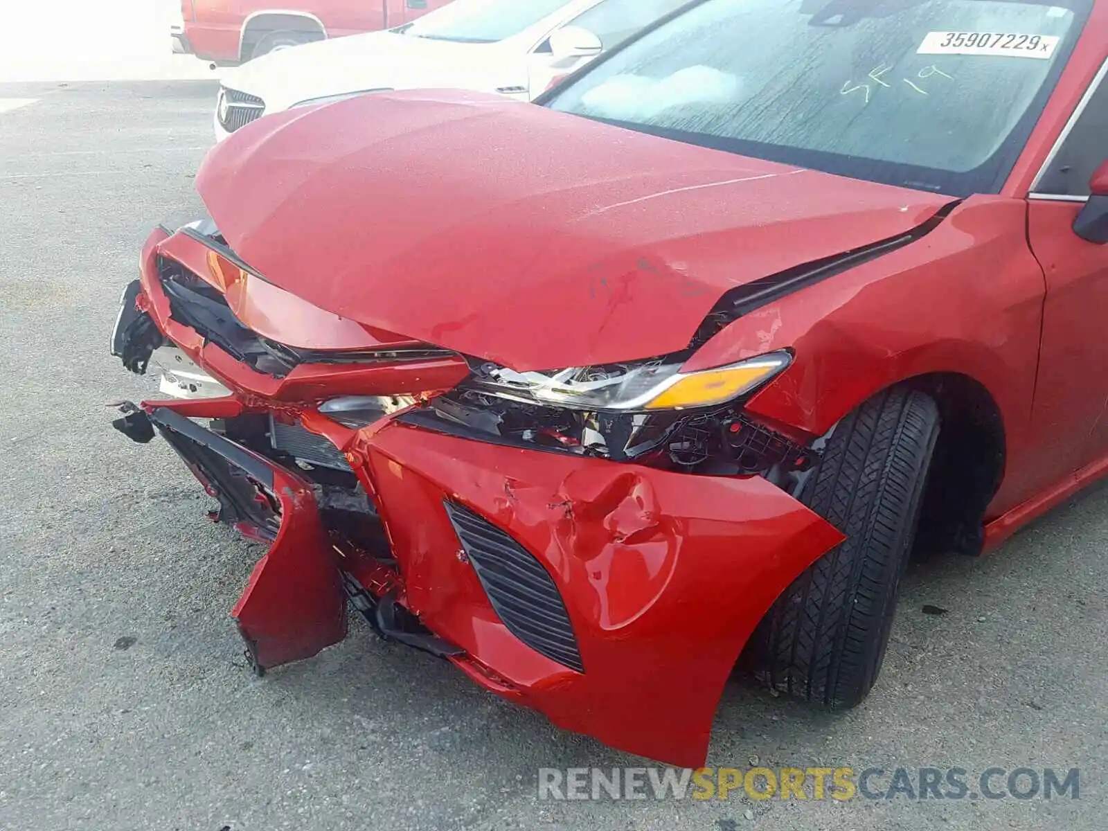 9 Photograph of a damaged car 4T1B11HK7KU251235 TOYOTA CAMRY 2019