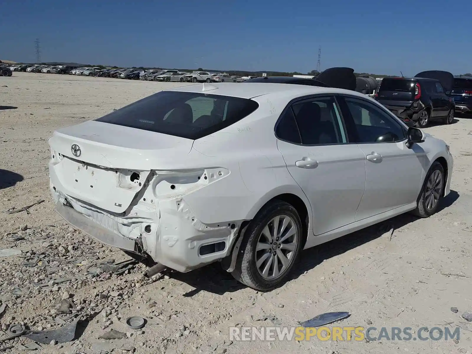 4 Photograph of a damaged car 4T1B11HK7KU261134 TOYOTA CAMRY 2019