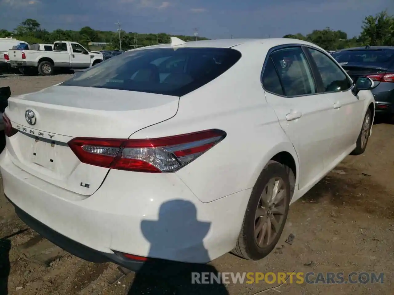 4 Photograph of a damaged car 4T1B11HK7KU261750 TOYOTA CAMRY 2019