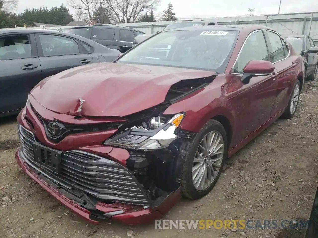 2 Photograph of a damaged car 4T1B11HK7KU295395 TOYOTA CAMRY 2019