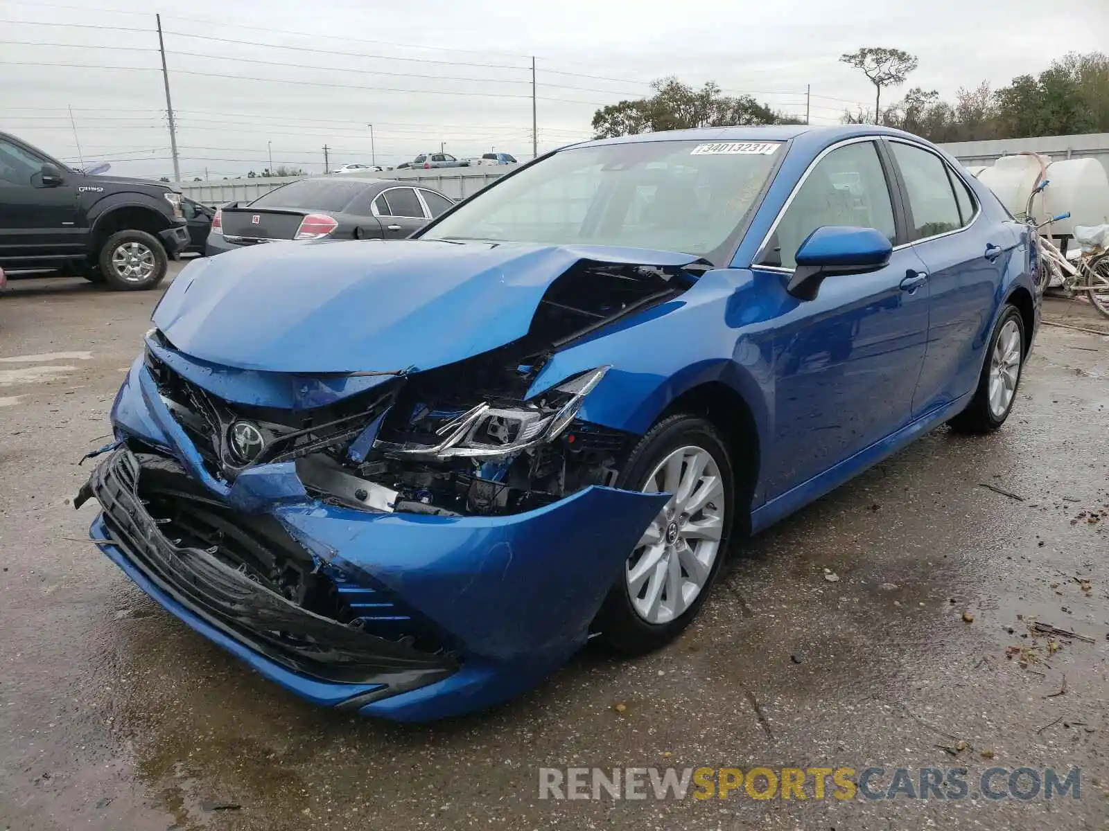 2 Photograph of a damaged car 4T1B11HK7KU299026 TOYOTA CAMRY 2019