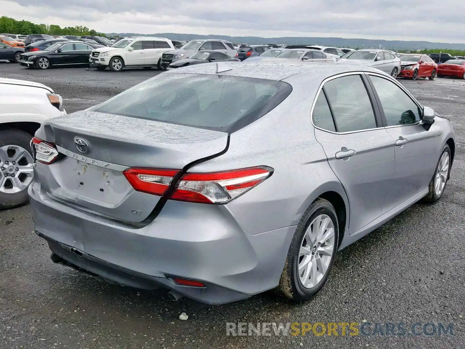 4 Photograph of a damaged car 4T1B11HK7KU681413 TOYOTA CAMRY 2019