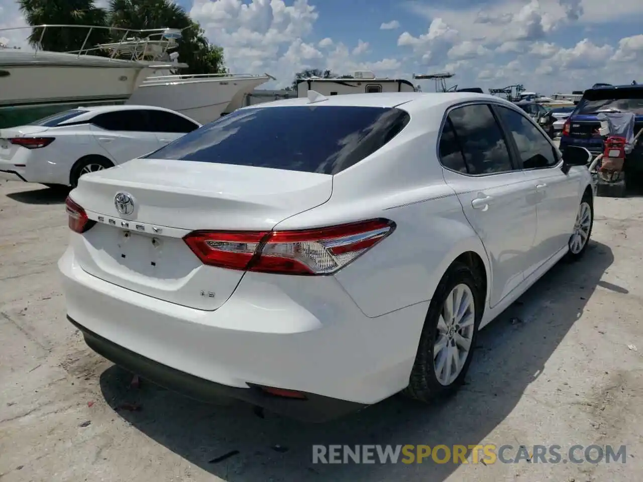 4 Photograph of a damaged car 4T1B11HK7KU681881 TOYOTA CAMRY 2019