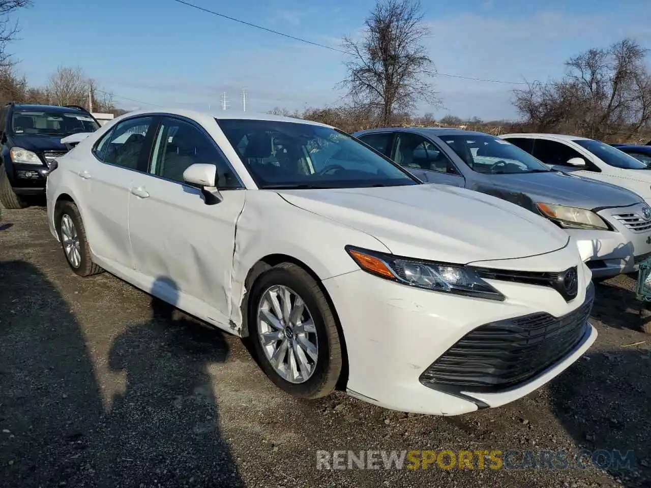 4 Photograph of a damaged car 4T1B11HK7KU688135 TOYOTA CAMRY 2019