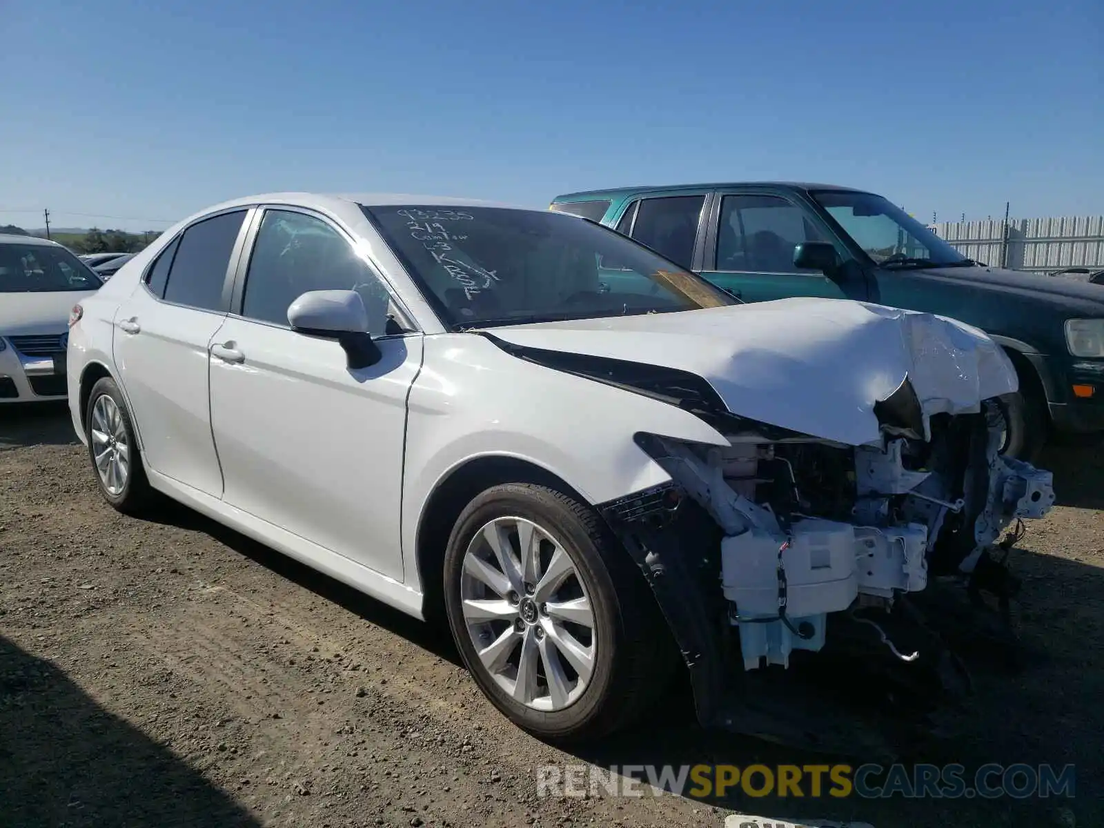 1 Photograph of a damaged car 4T1B11HK7KU688295 TOYOTA CAMRY 2019