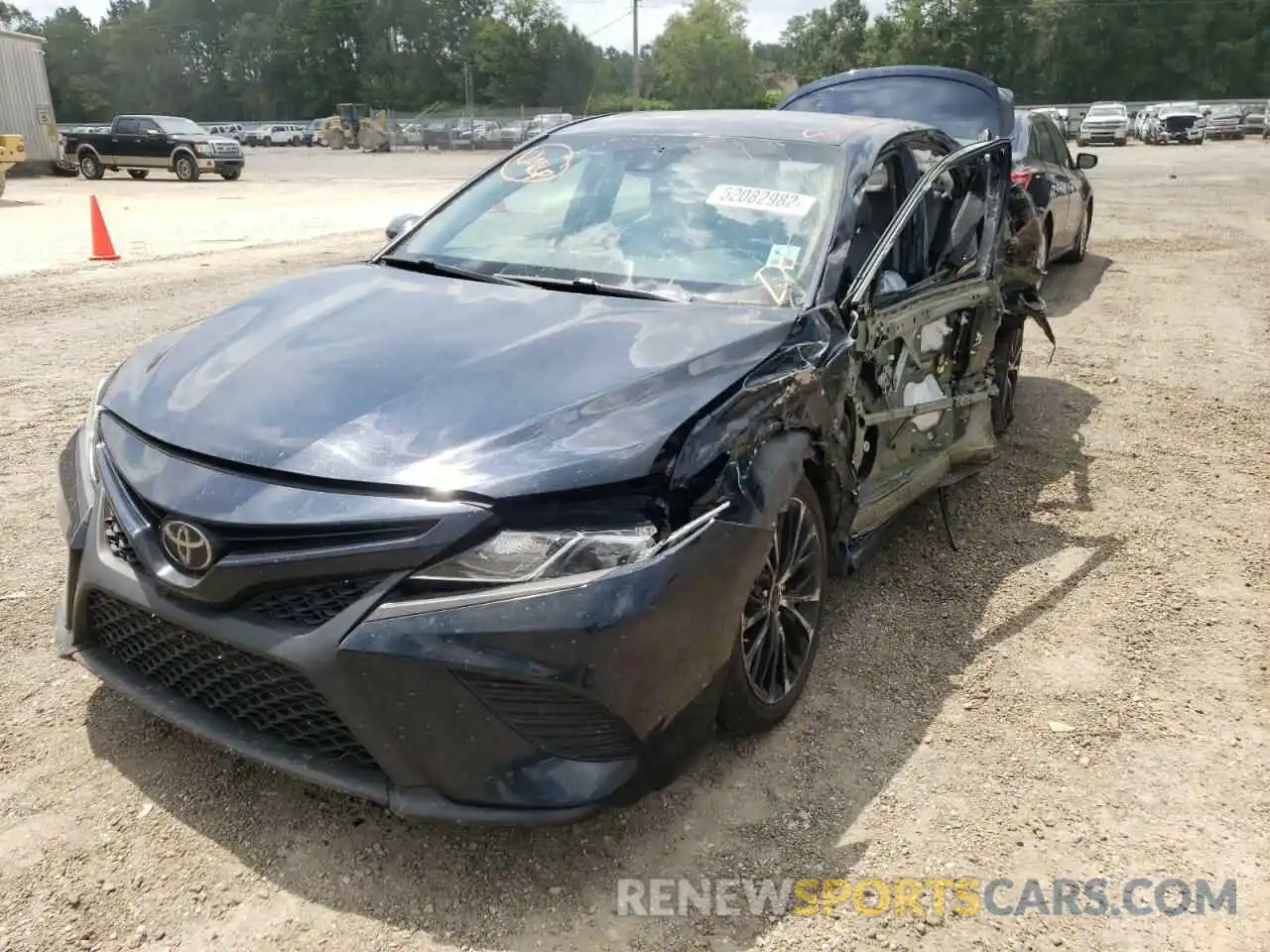 2 Photograph of a damaged car 4T1B11HK7KU695389 TOYOTA CAMRY 2019