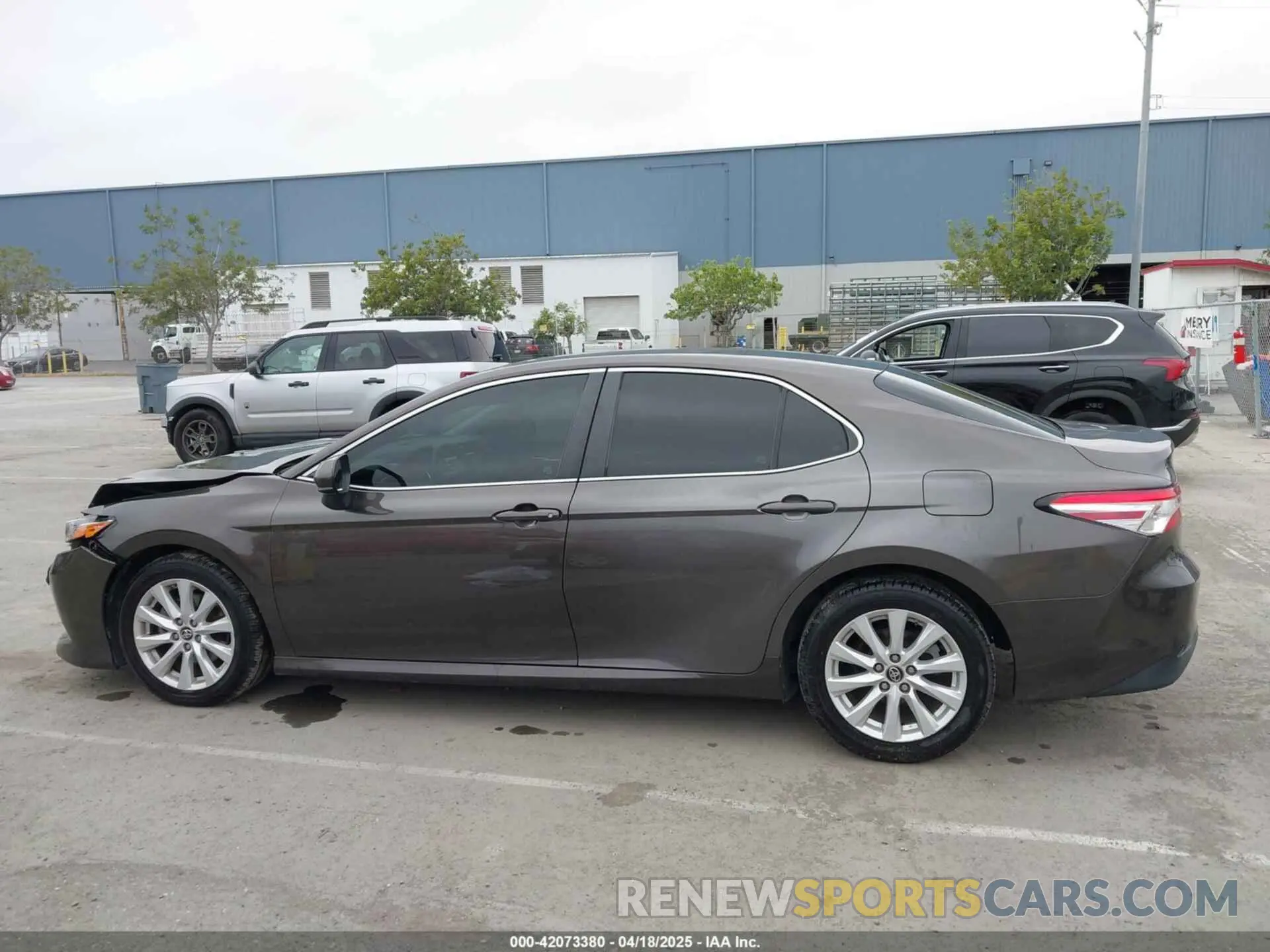 14 Photograph of a damaged car 4T1B11HK7KU702244 TOYOTA CAMRY 2019