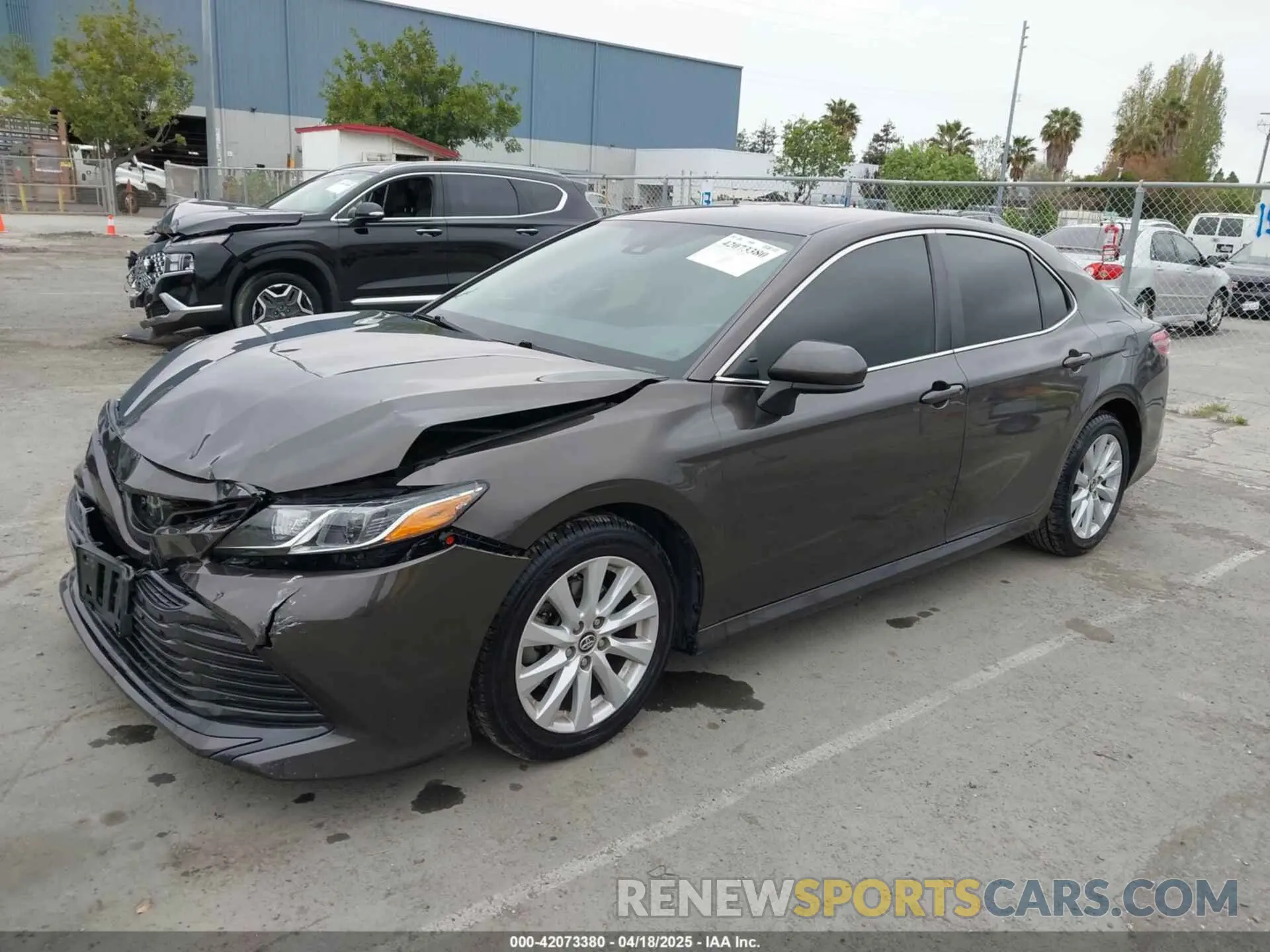 2 Photograph of a damaged car 4T1B11HK7KU702244 TOYOTA CAMRY 2019