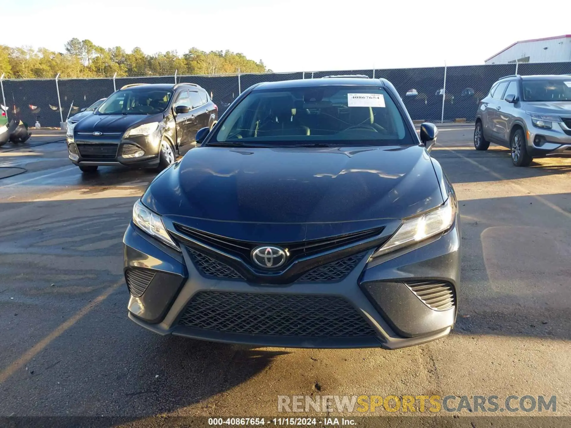 12 Photograph of a damaged car 4T1B11HK7KU702857 TOYOTA CAMRY 2019
