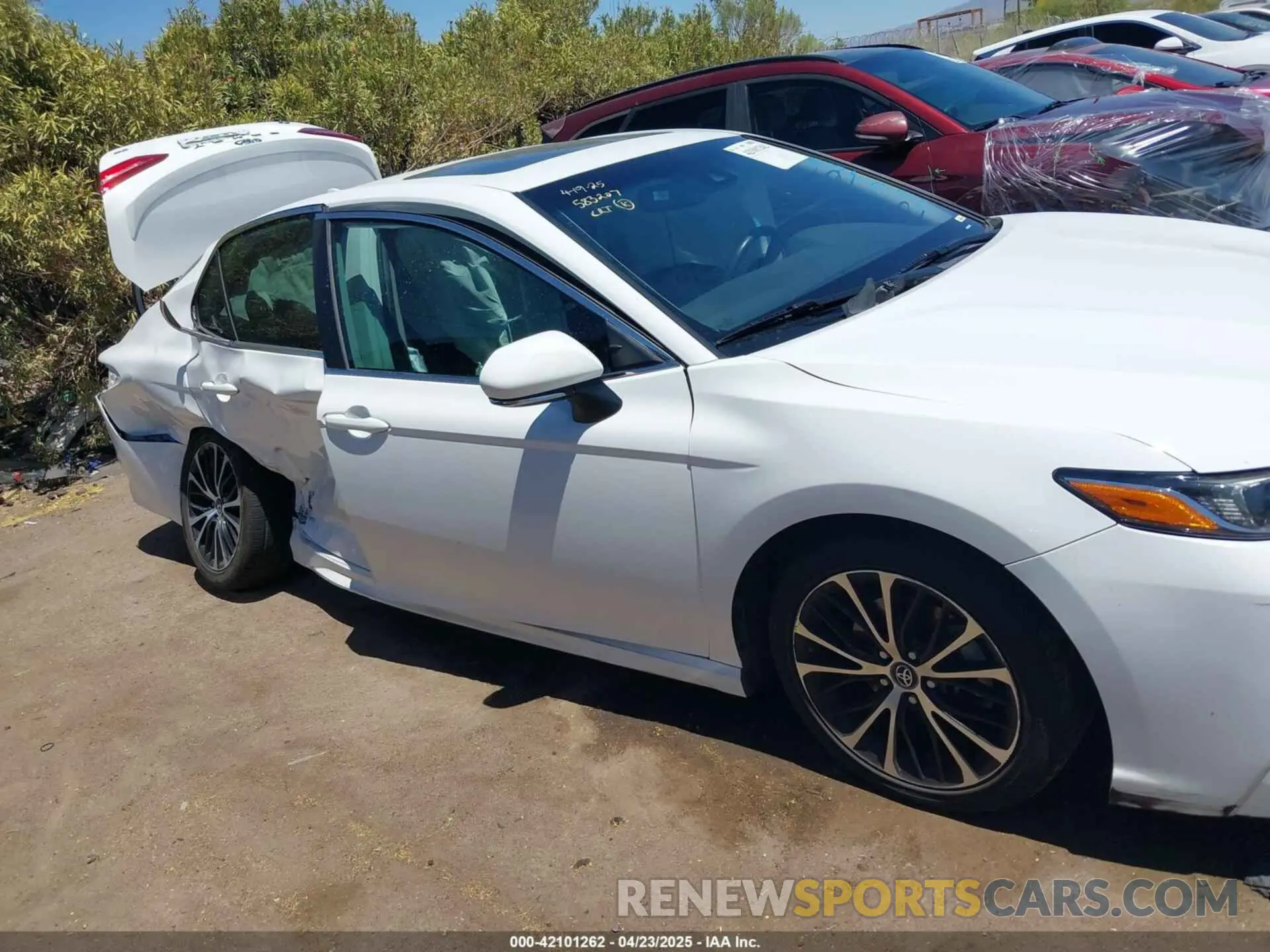 14 Photograph of a damaged car 4T1B11HK7KU702969 TOYOTA CAMRY 2019