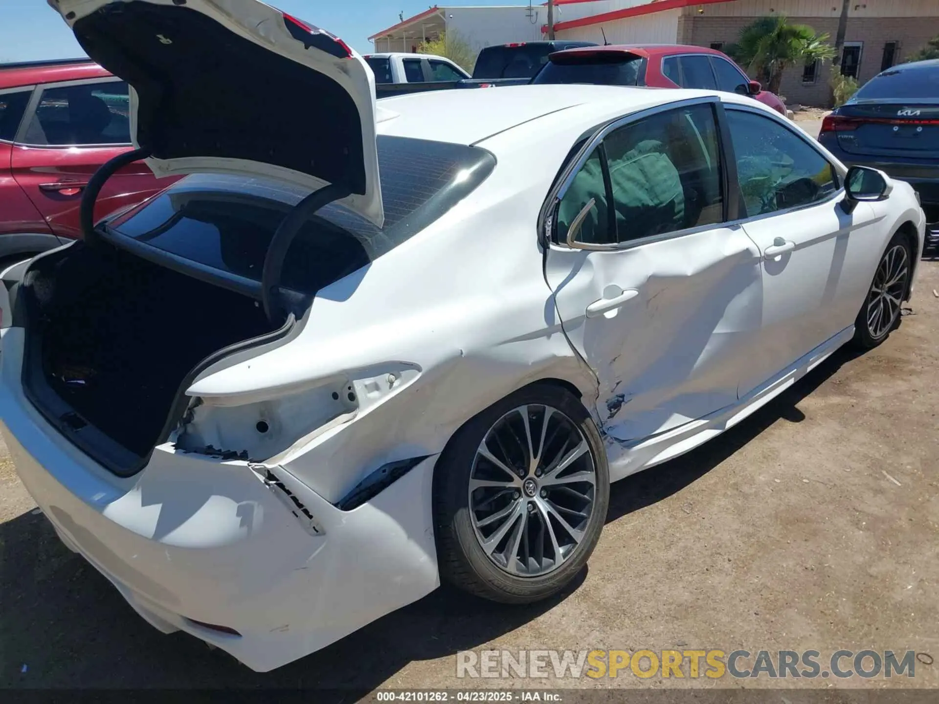 4 Photograph of a damaged car 4T1B11HK7KU702969 TOYOTA CAMRY 2019