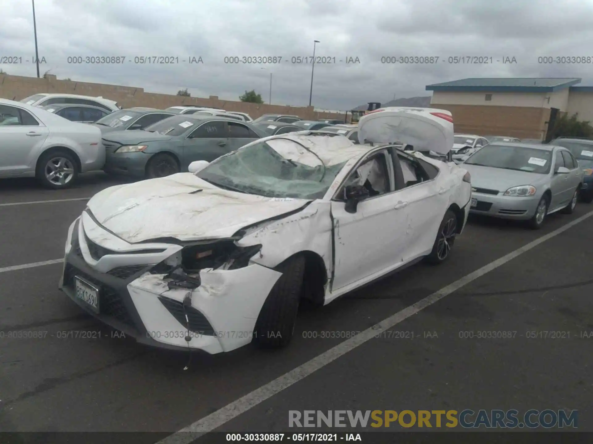 2 Photograph of a damaged car 4T1B11HK7KU706262 TOYOTA CAMRY 2019