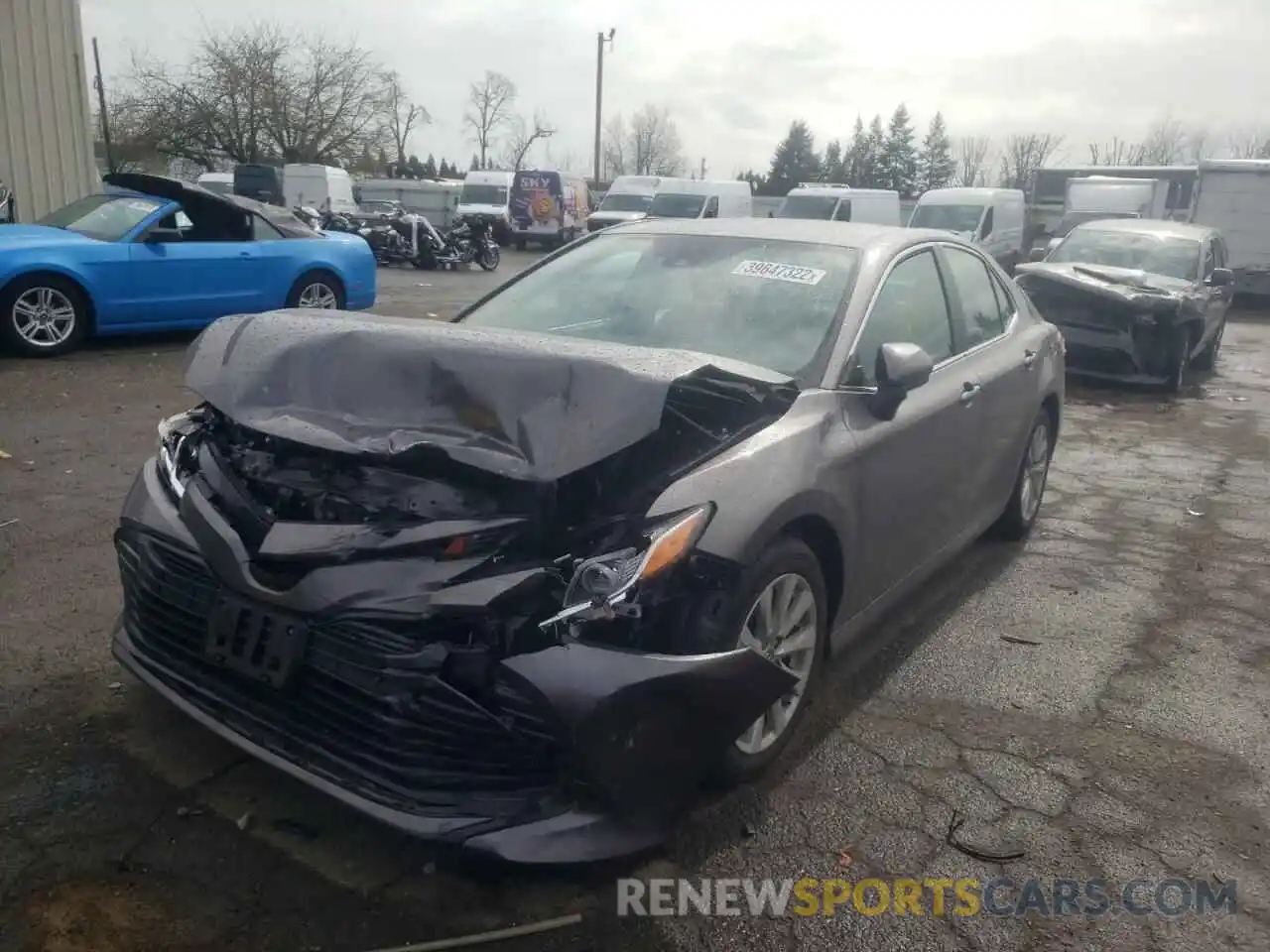 2 Photograph of a damaged car 4T1B11HK7KU715463 TOYOTA CAMRY 2019