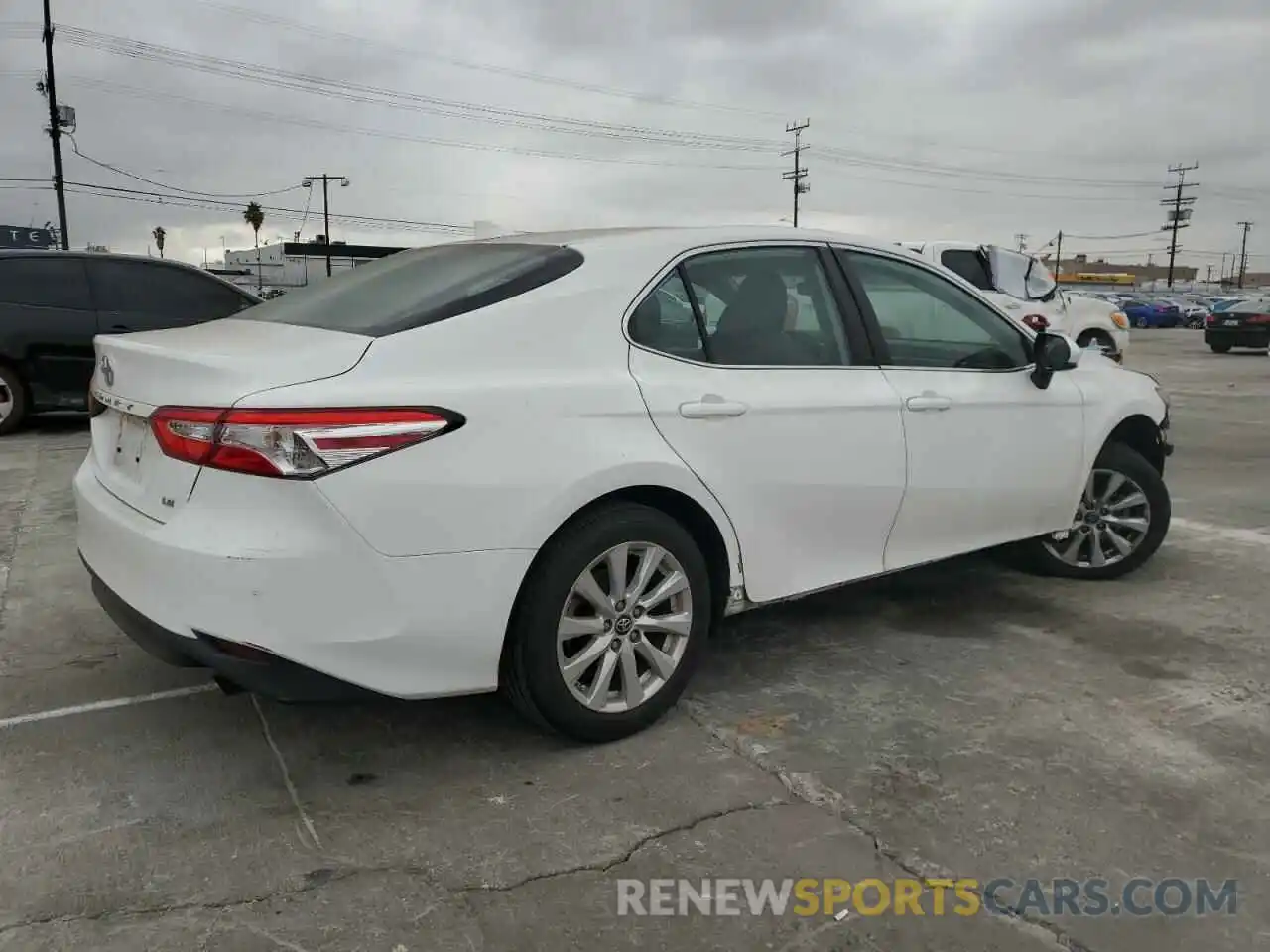 3 Photograph of a damaged car 4T1B11HK7KU715771 TOYOTA CAMRY 2019