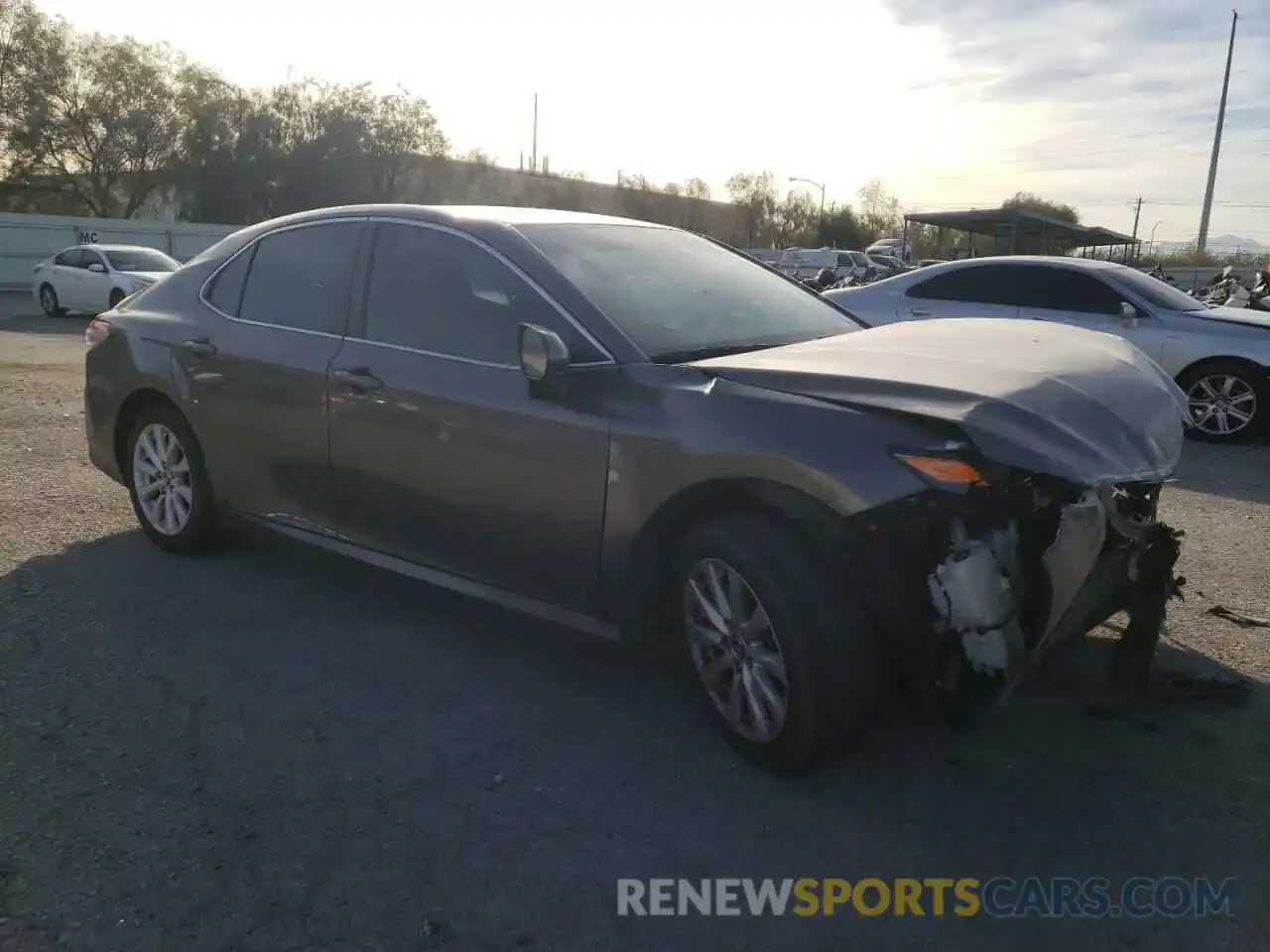 4 Photograph of a damaged car 4T1B11HK7KU725992 TOYOTA CAMRY 2019