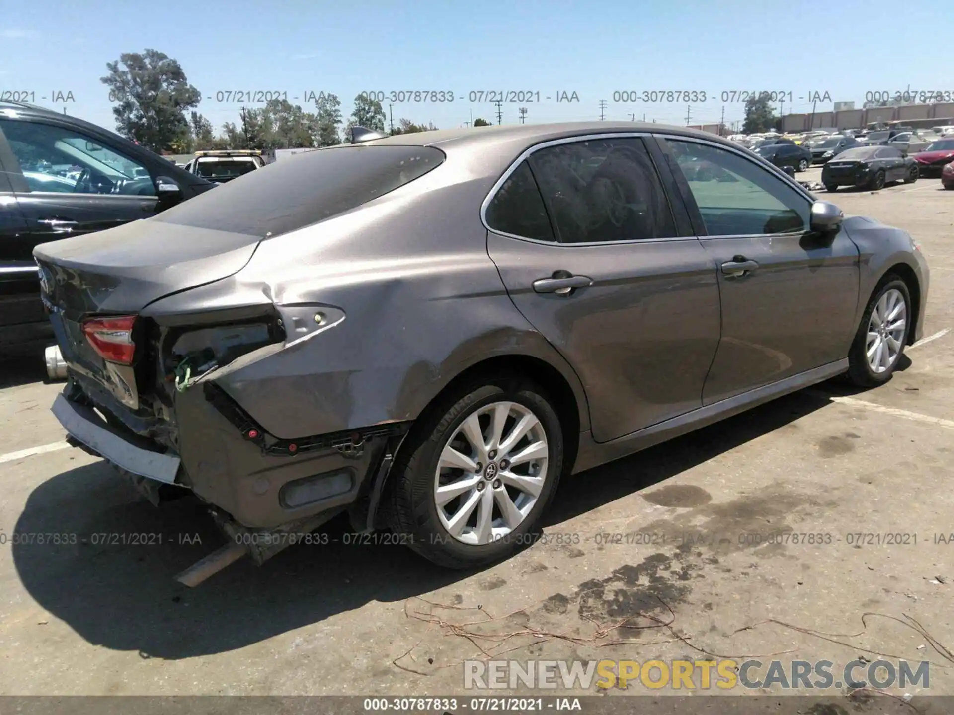 4 Photograph of a damaged car 4T1B11HK7KU730612 TOYOTA CAMRY 2019