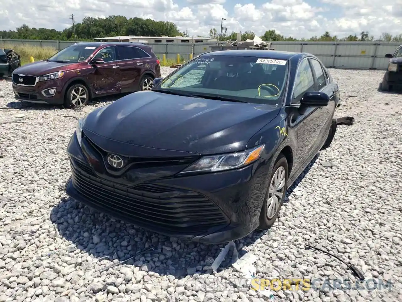 2 Photograph of a damaged car 4T1B11HK7KU732005 TOYOTA CAMRY 2019