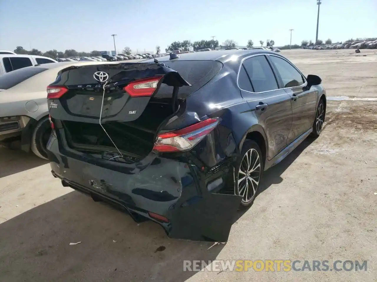 4 Photograph of a damaged car 4T1B11HK7KU737723 TOYOTA CAMRY 2019