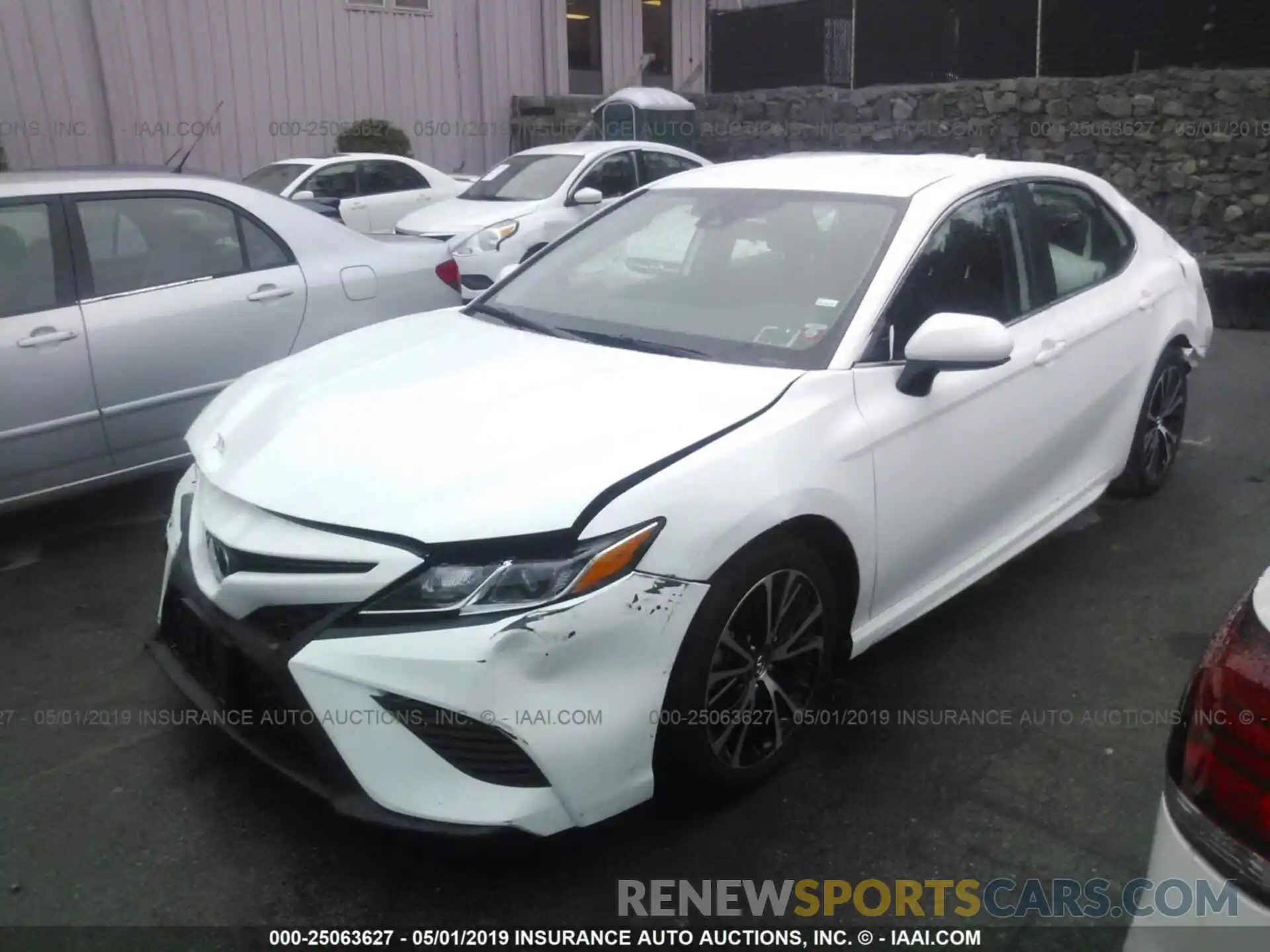 2 Photograph of a damaged car 4T1B11HK7KU740573 TOYOTA CAMRY 2019