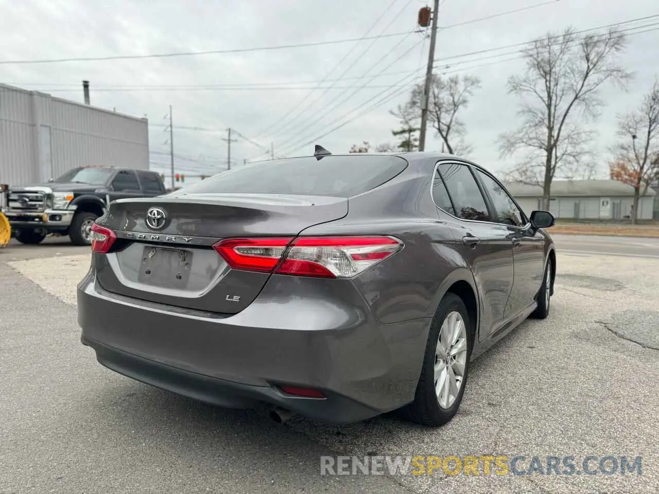 4 Photograph of a damaged car 4T1B11HK7KU741867 TOYOTA CAMRY 2019
