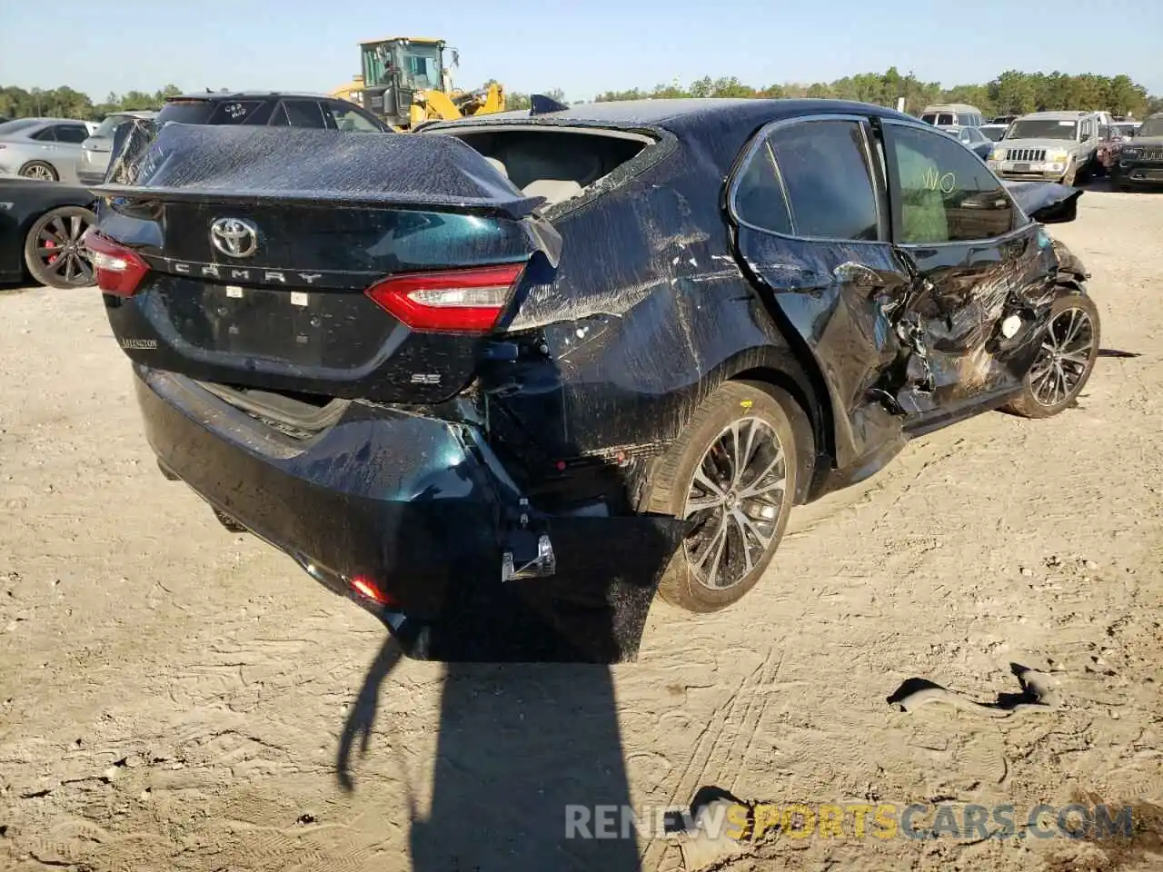 4 Photograph of a damaged car 4T1B11HK7KU743800 TOYOTA CAMRY 2019