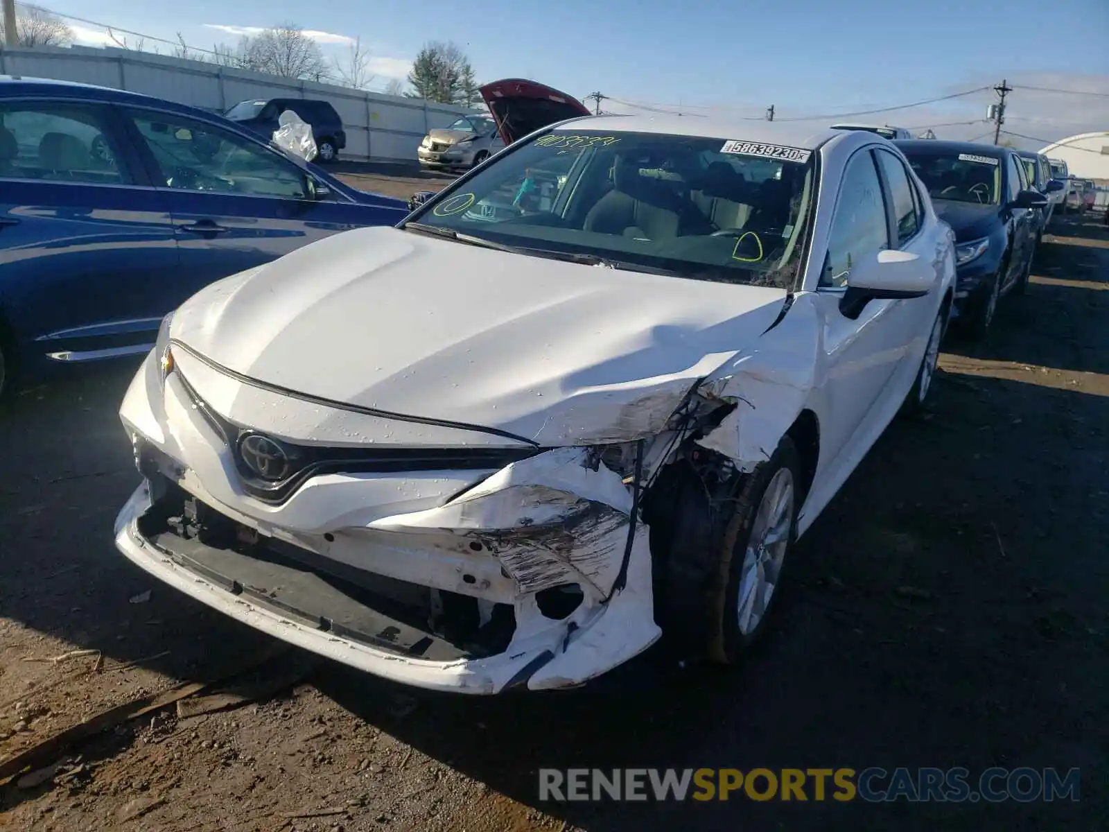 2 Photograph of a damaged car 4T1B11HK7KU745384 TOYOTA CAMRY 2019