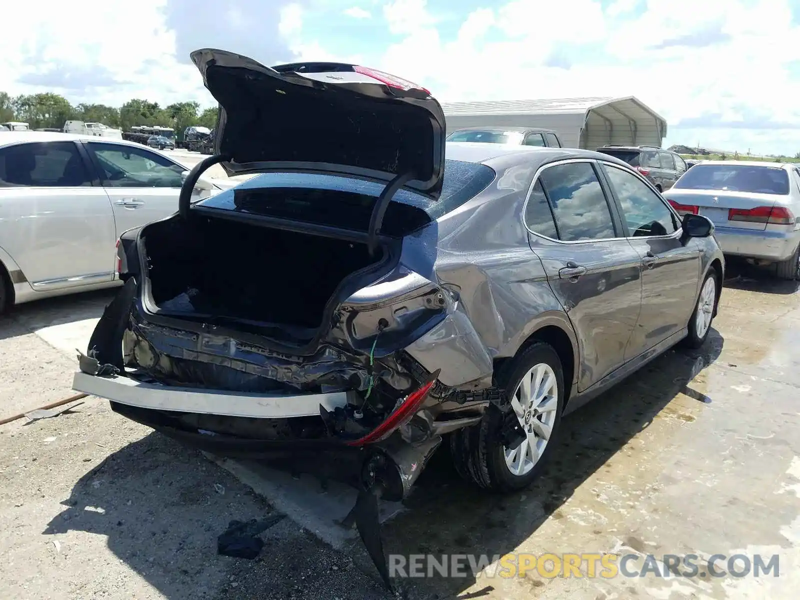 4 Photograph of a damaged car 4T1B11HK7KU749807 TOYOTA CAMRY 2019