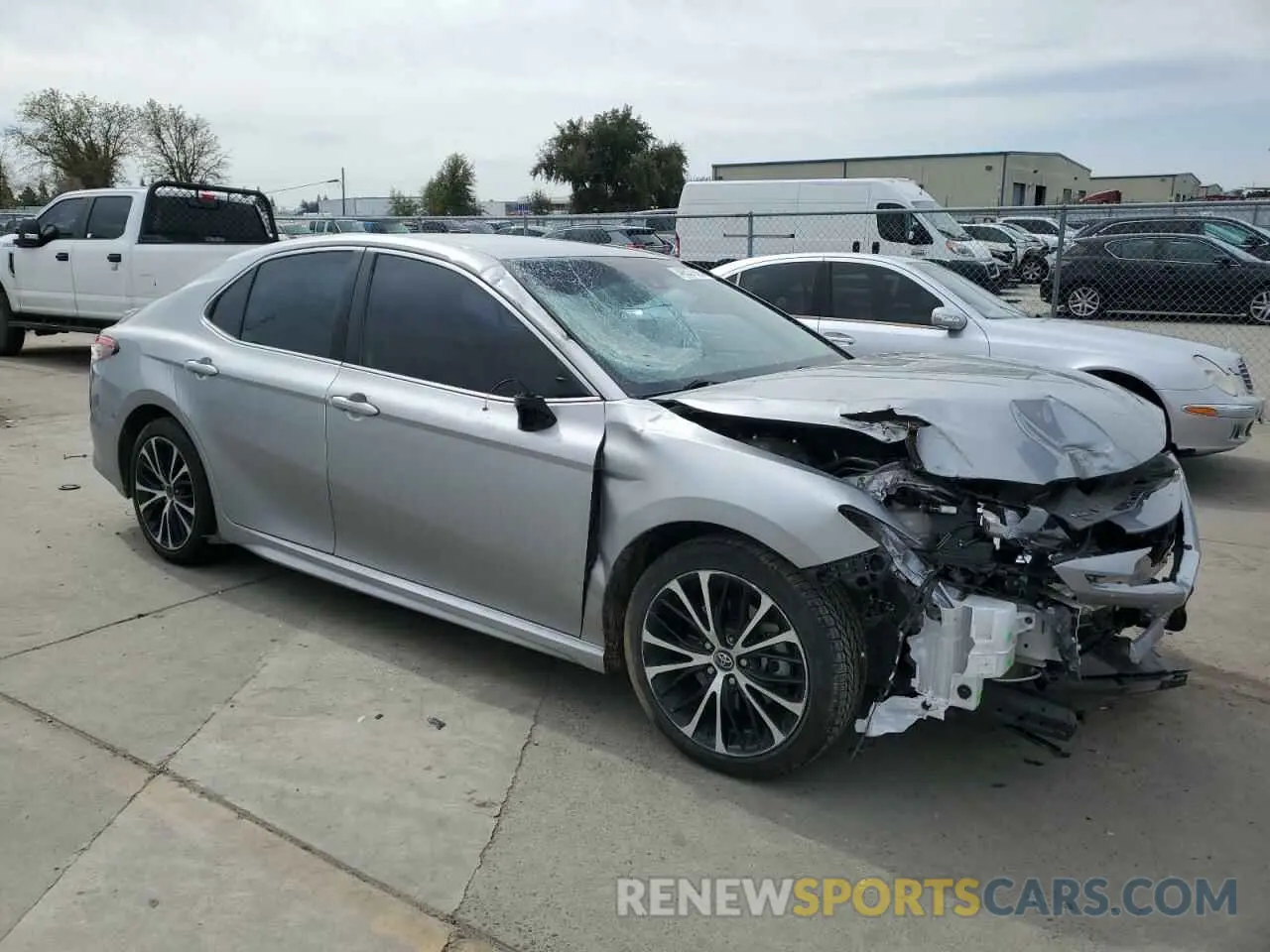 4 Photograph of a damaged car 4T1B11HK7KU752853 TOYOTA CAMRY 2019