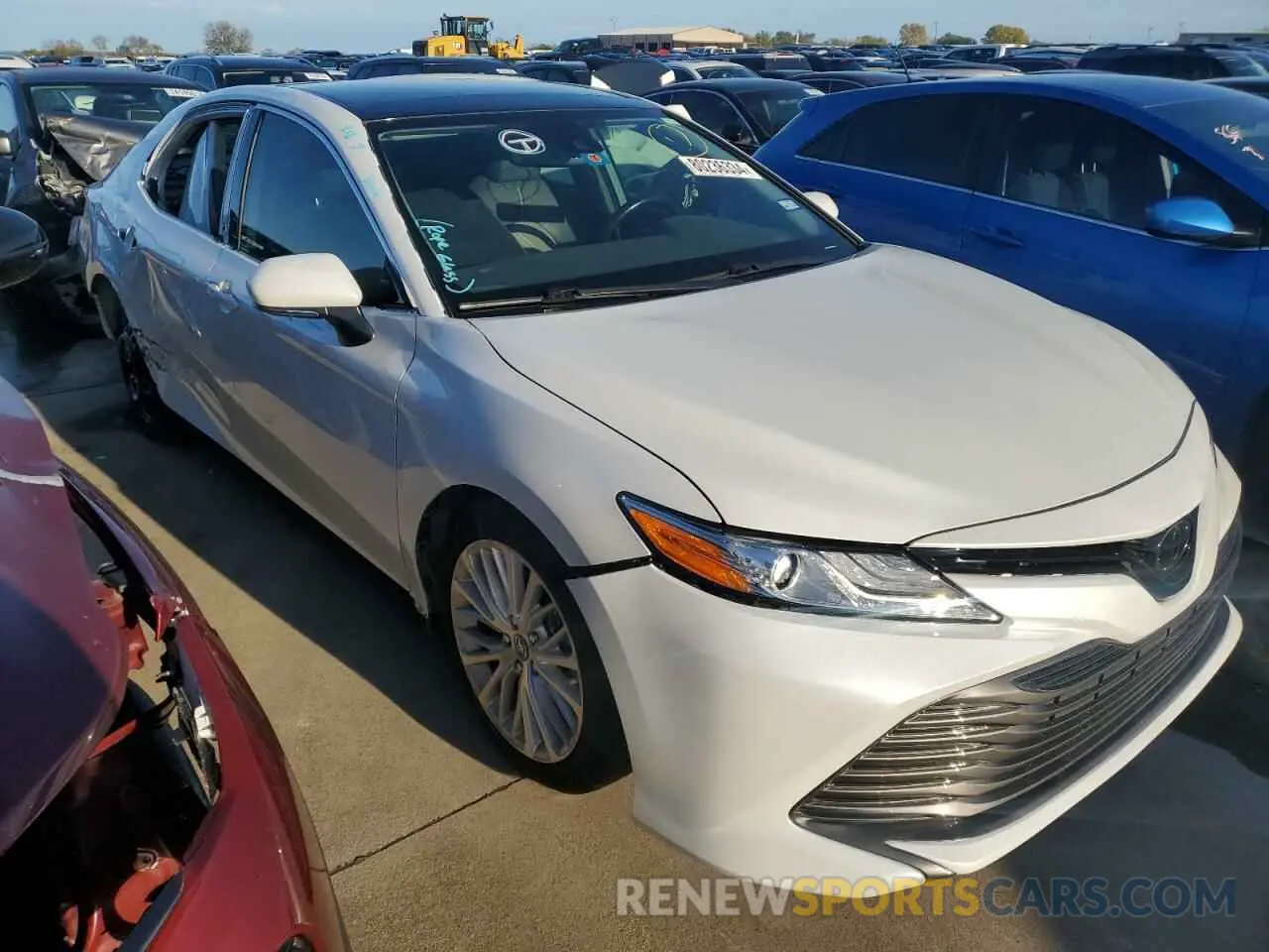 4 Photograph of a damaged car 4T1B11HK7KU753159 TOYOTA CAMRY 2019