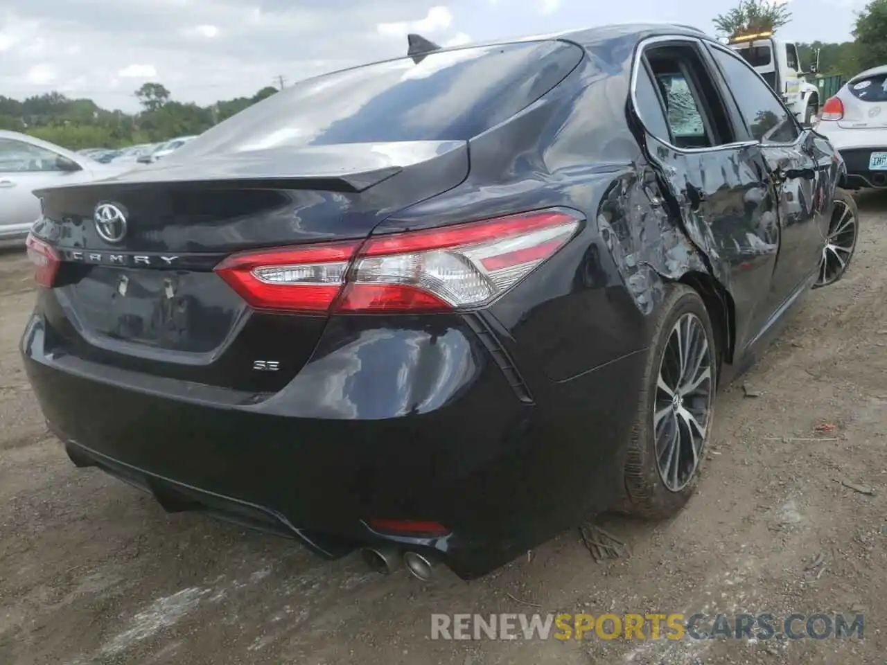 4 Photograph of a damaged car 4T1B11HK7KU753923 TOYOTA CAMRY 2019