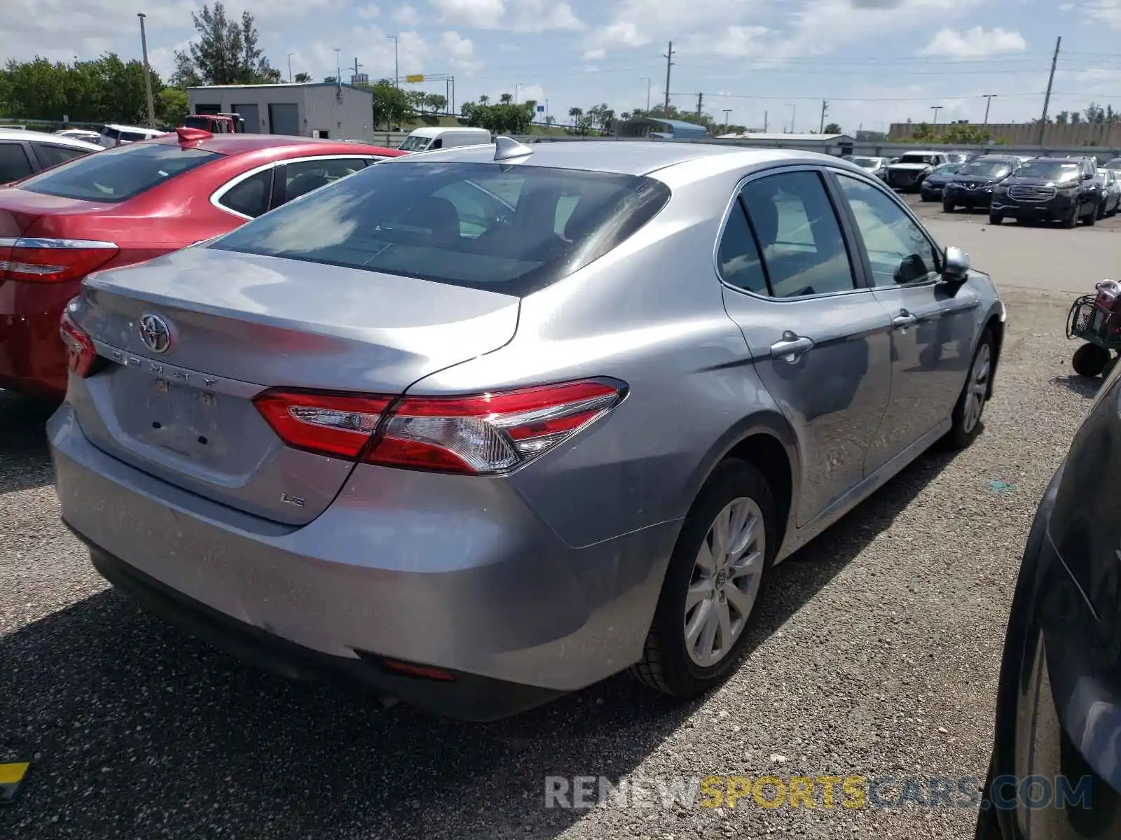 4 Photograph of a damaged car 4T1B11HK7KU756059 TOYOTA CAMRY 2019