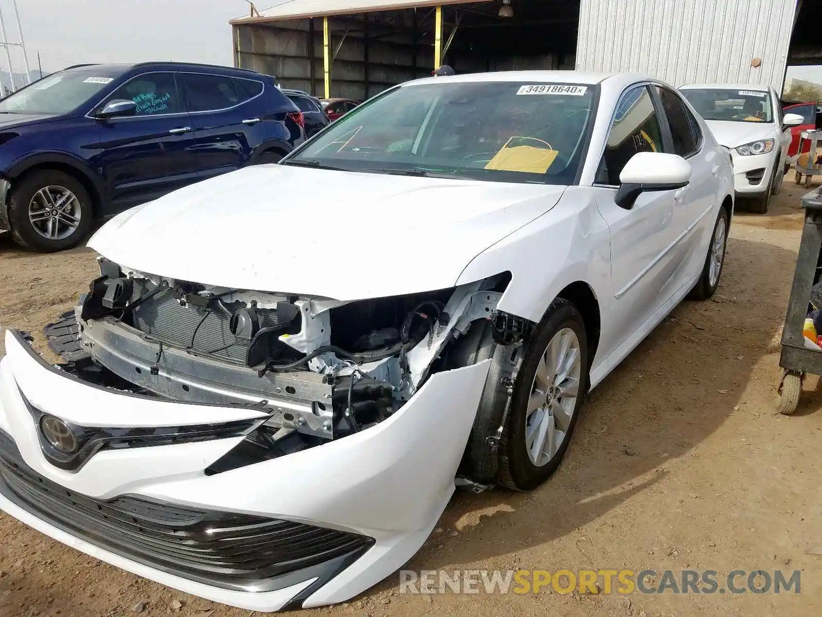 2 Photograph of a damaged car 4T1B11HK7KU757177 TOYOTA CAMRY 2019