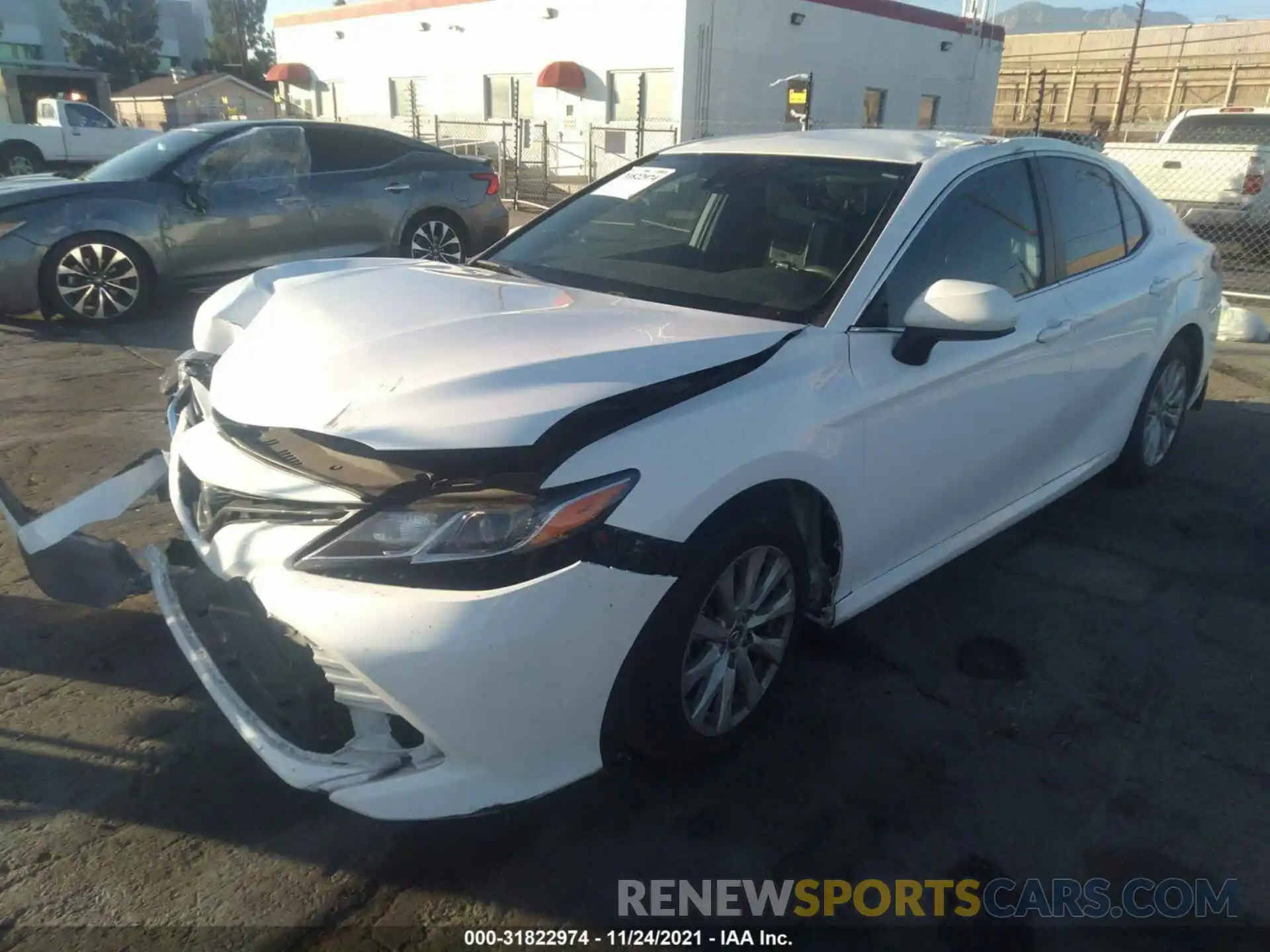 2 Photograph of a damaged car 4T1B11HK7KU759656 TOYOTA CAMRY 2019