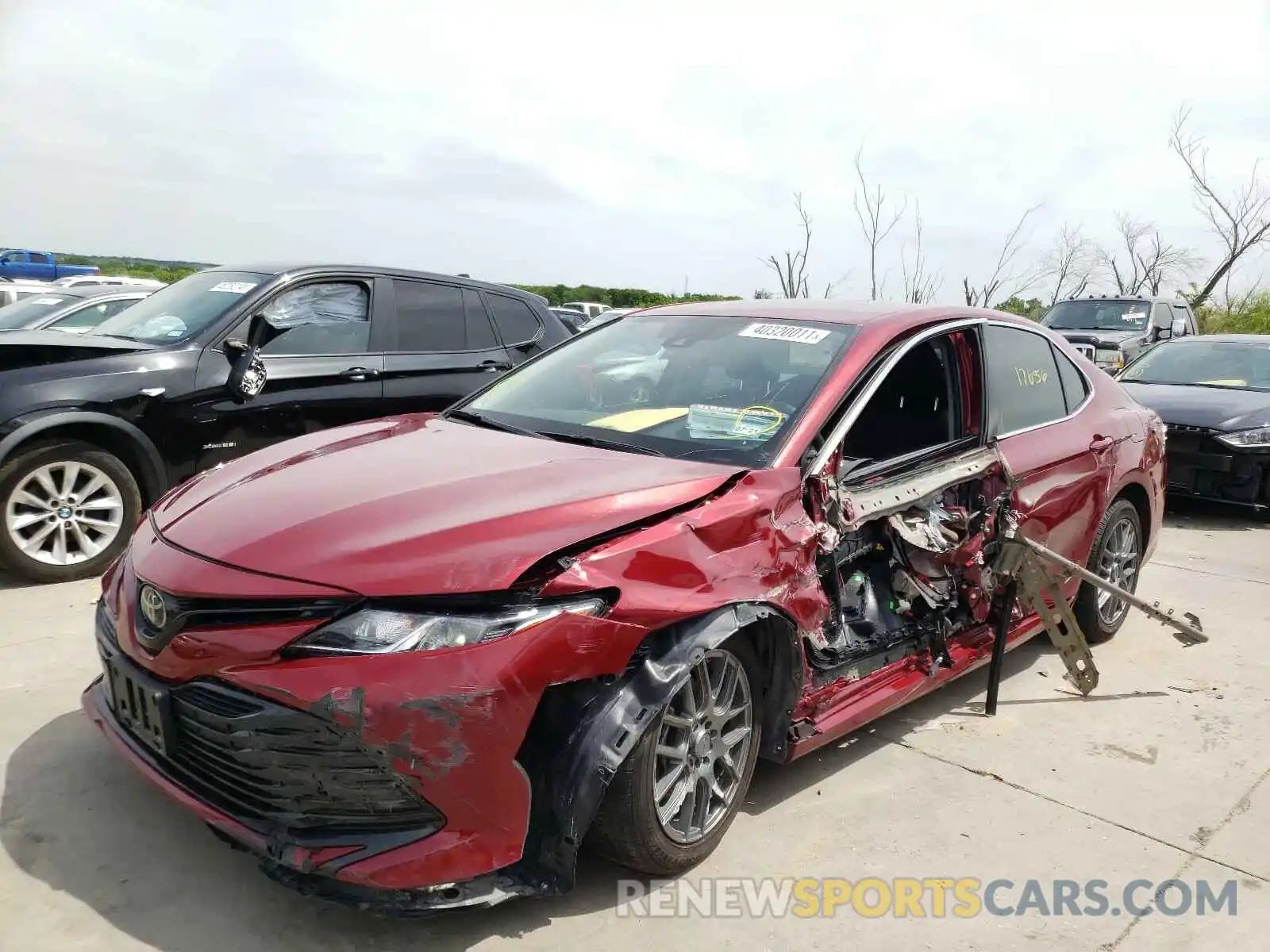 2 Photograph of a damaged car 4T1B11HK7KU761794 TOYOTA CAMRY 2019