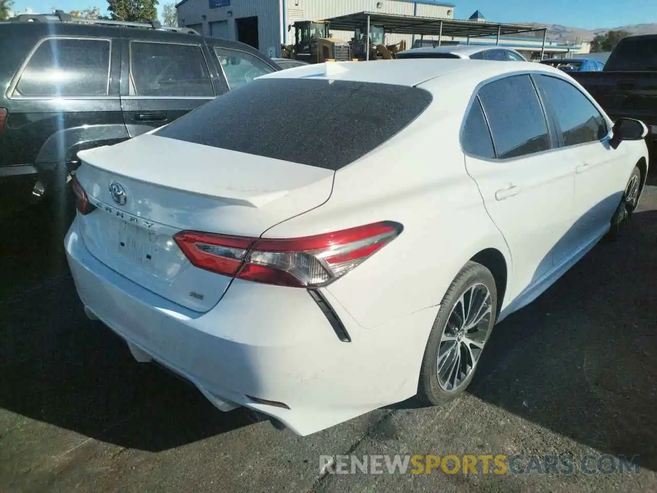 4 Photograph of a damaged car 4T1B11HK7KU770852 TOYOTA CAMRY 2019