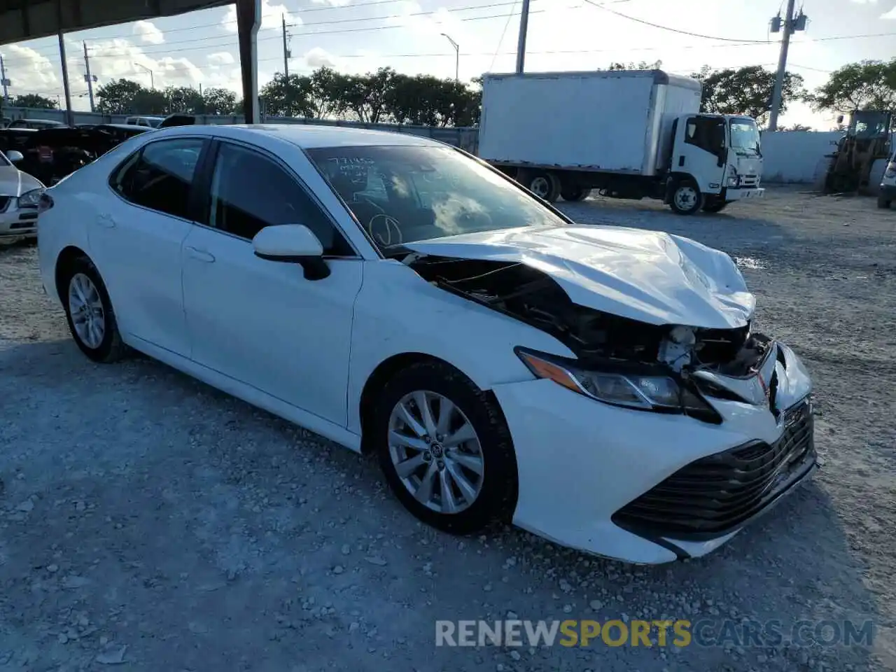 4 Photograph of a damaged car 4T1B11HK7KU771452 TOYOTA CAMRY 2019