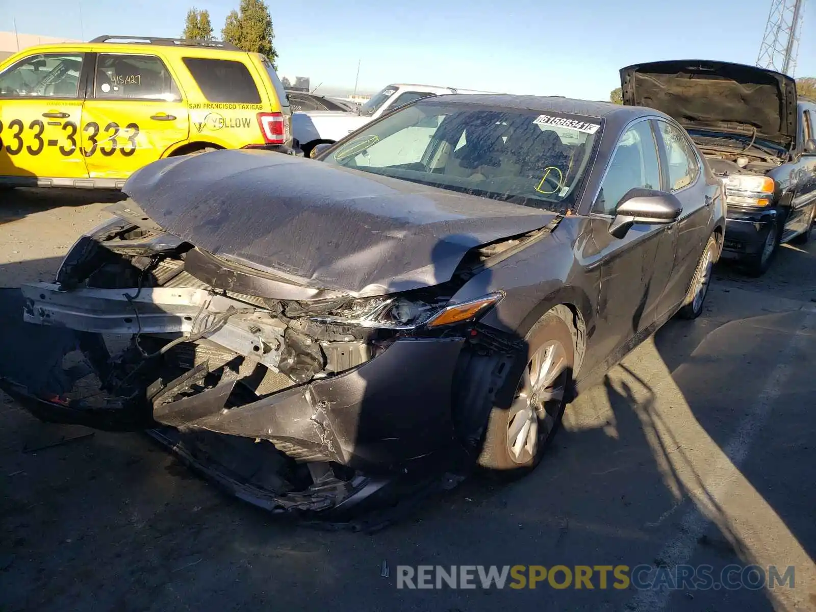 2 Photograph of a damaged car 4T1B11HK7KU771595 TOYOTA CAMRY 2019