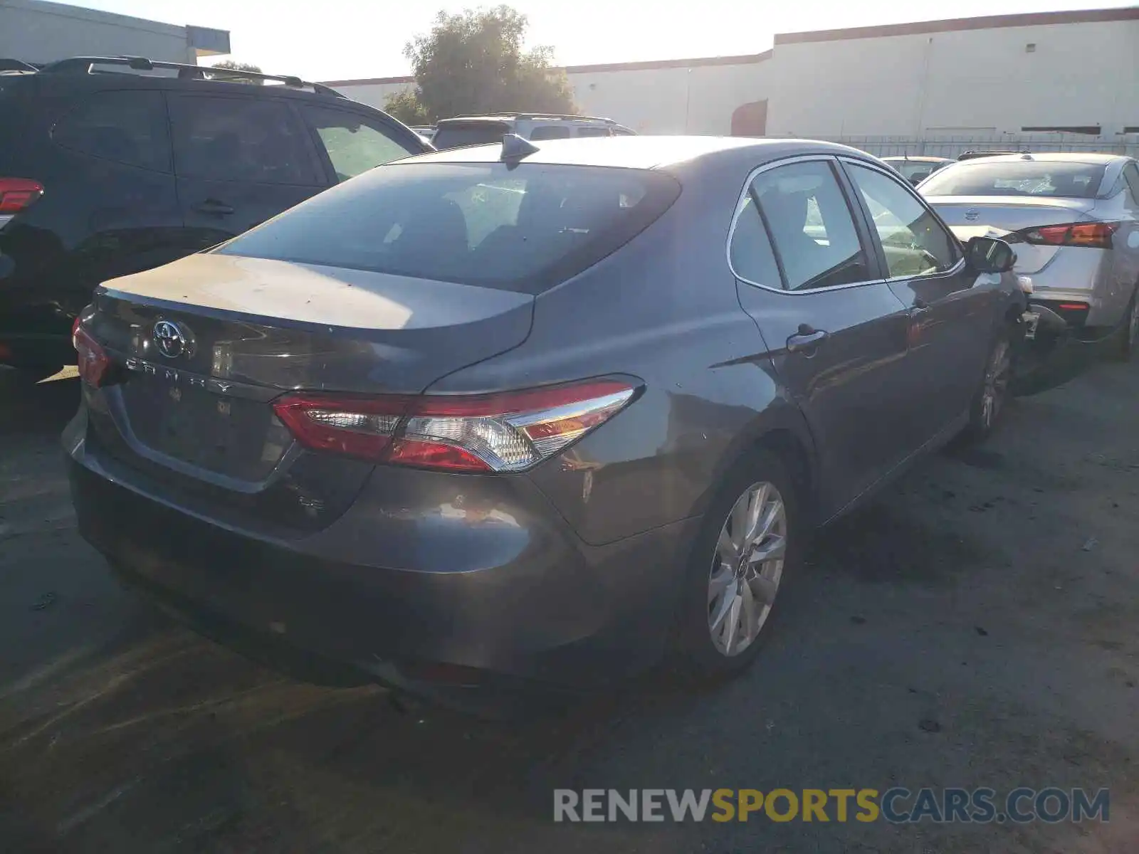 4 Photograph of a damaged car 4T1B11HK7KU771595 TOYOTA CAMRY 2019