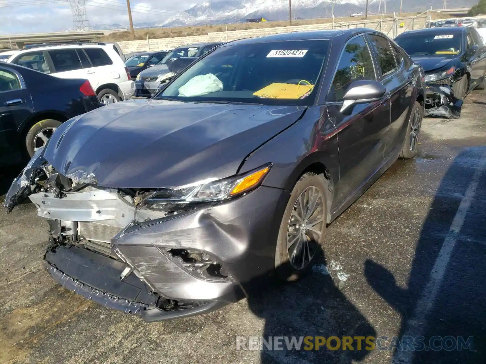 2 Photograph of a damaged car 4T1B11HK7KU773637 TOYOTA CAMRY 2019