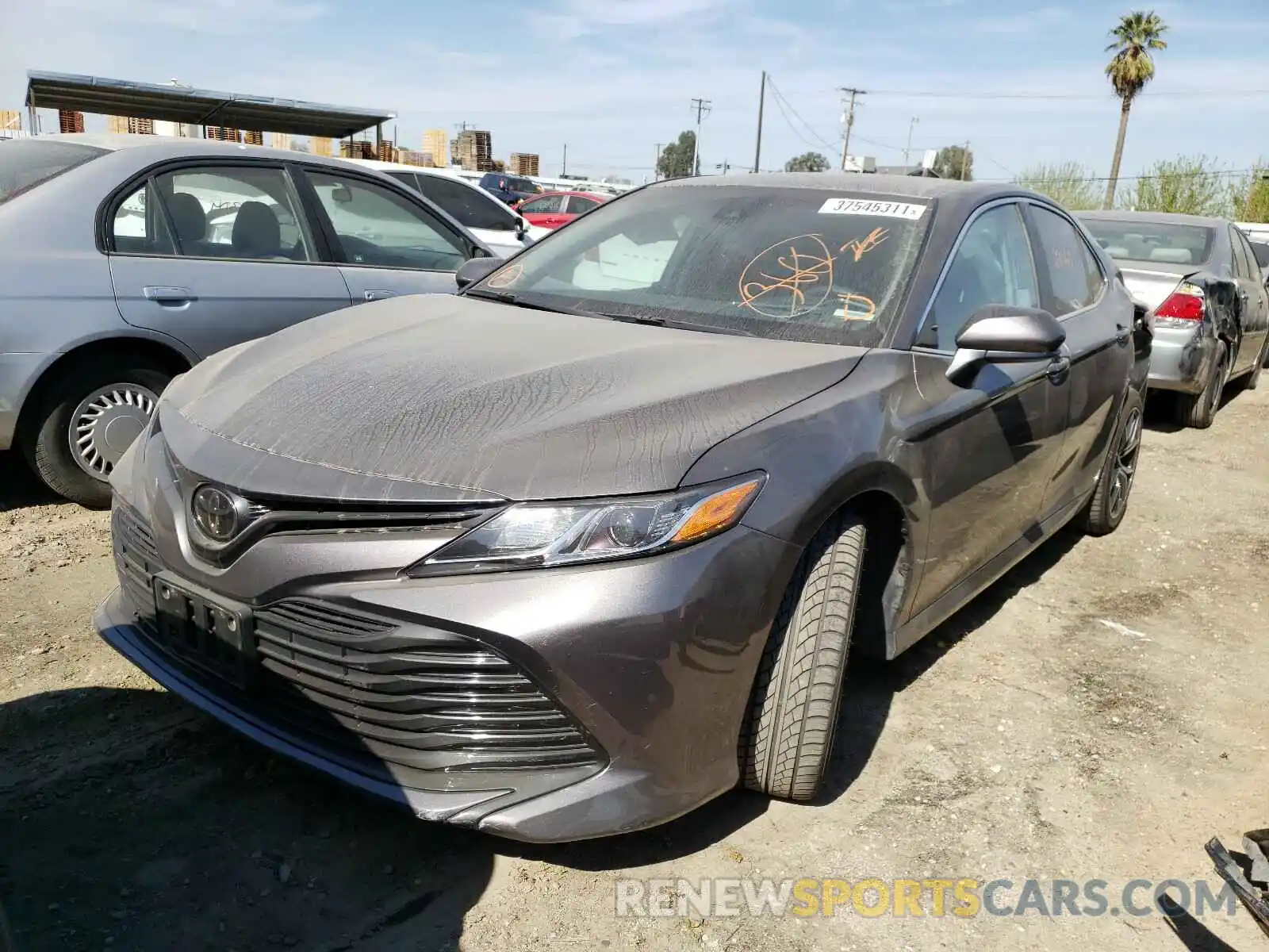 2 Photograph of a damaged car 4T1B11HK7KU777042 TOYOTA CAMRY 2019