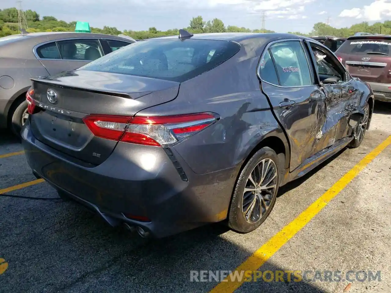 4 Photograph of a damaged car 4T1B11HK7KU781592 TOYOTA CAMRY 2019