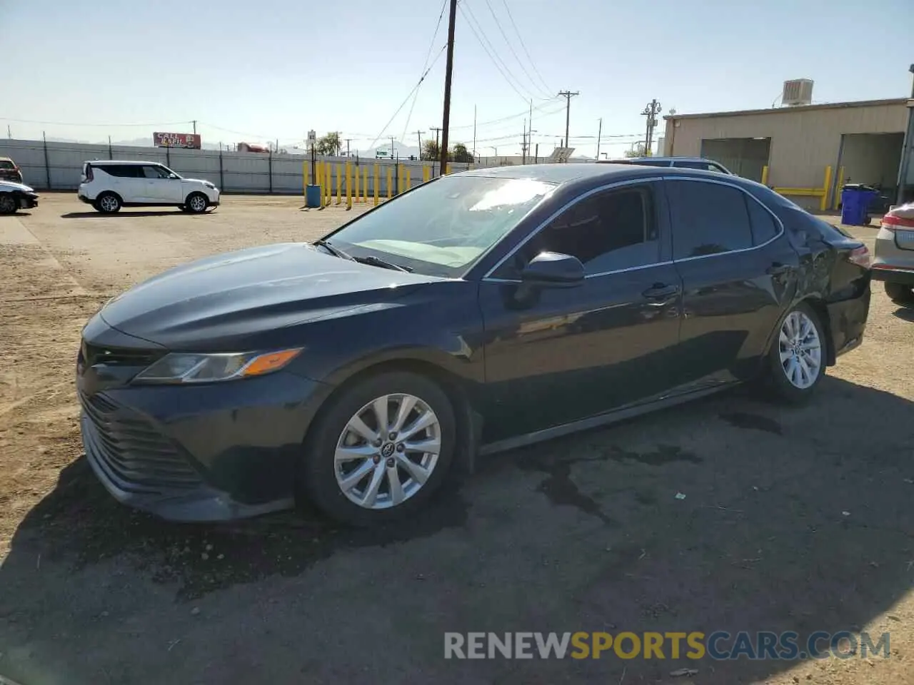 2 Photograph of a damaged car 4T1B11HK7KU794794 TOYOTA CAMRY 2019