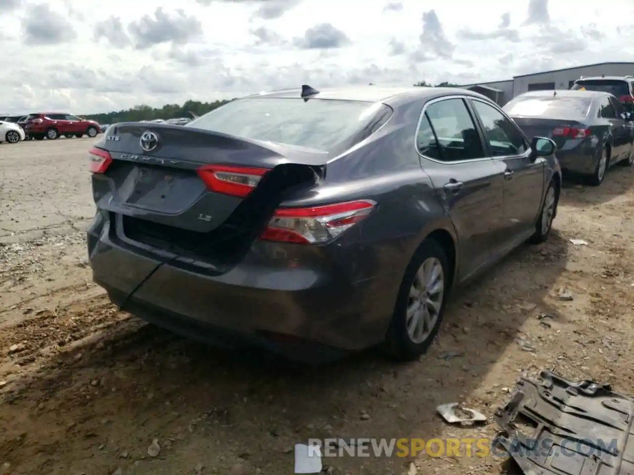 4 Photograph of a damaged car 4T1B11HK7KU802313 TOYOTA CAMRY 2019