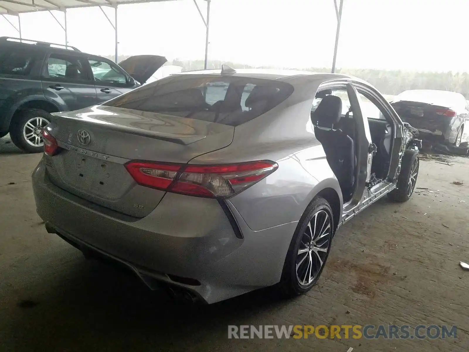 4 Photograph of a damaged car 4T1B11HK7KU803056 TOYOTA CAMRY 2019