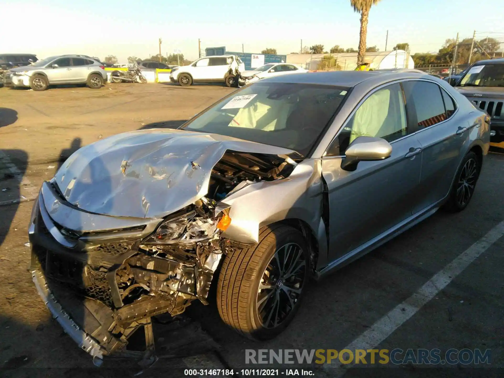 2 Photograph of a damaged car 4T1B11HK7KU804059 TOYOTA CAMRY 2019