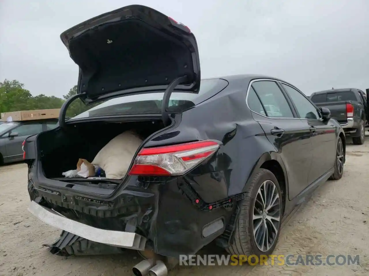 4 Photograph of a damaged car 4T1B11HK7KU807673 TOYOTA CAMRY 2019