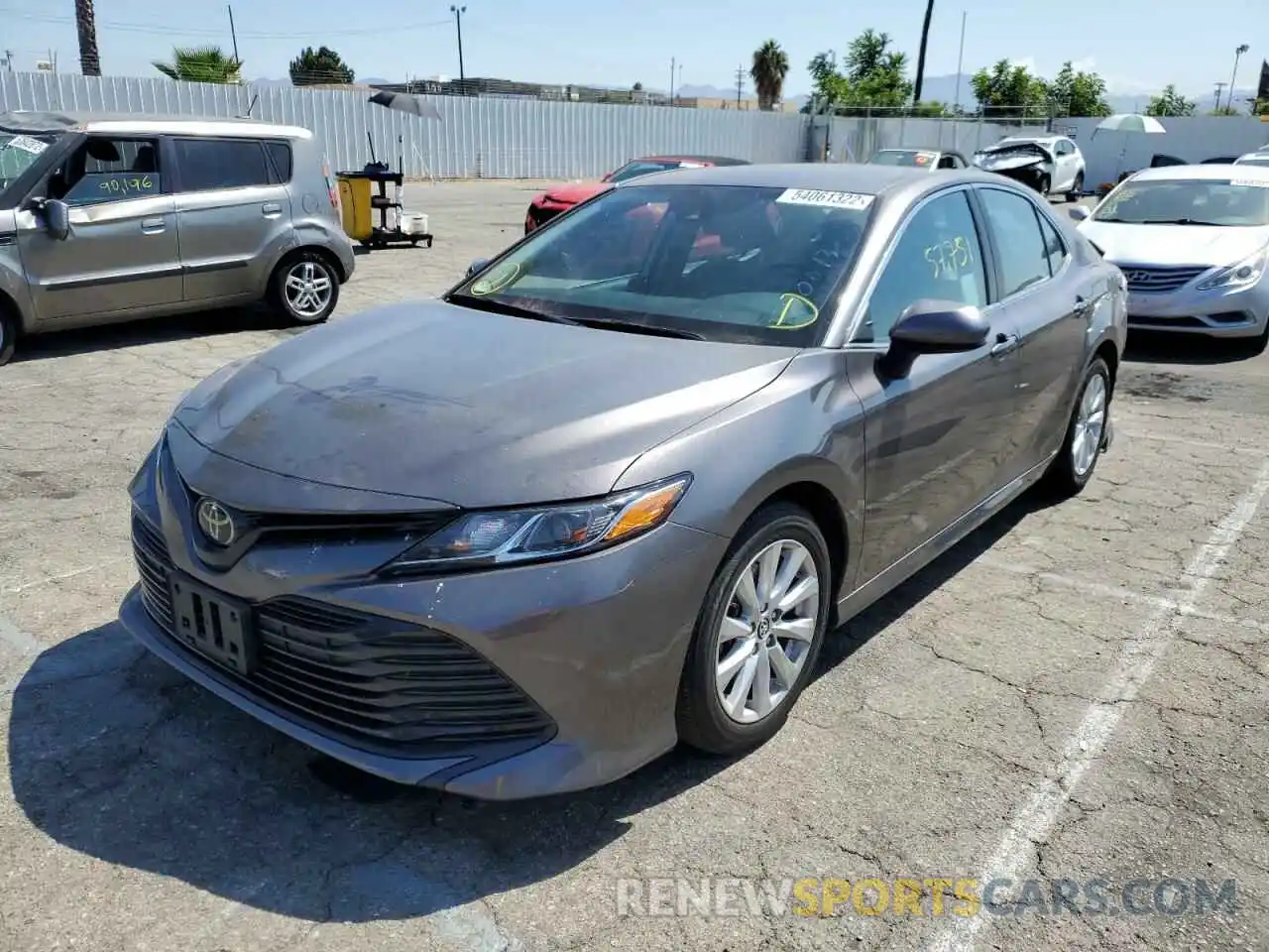 2 Photograph of a damaged car 4T1B11HK7KU807737 TOYOTA CAMRY 2019