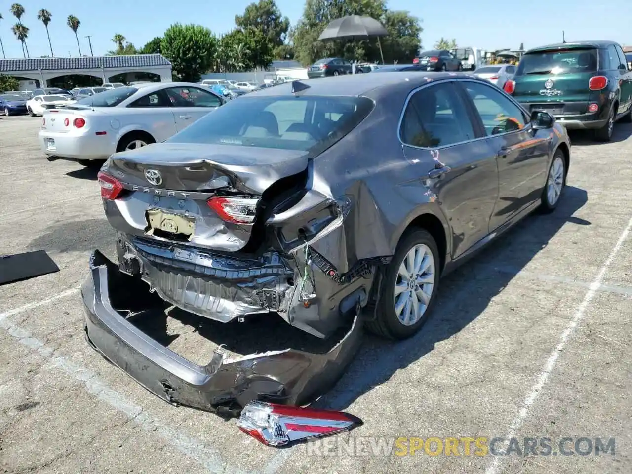 4 Photograph of a damaged car 4T1B11HK7KU807737 TOYOTA CAMRY 2019